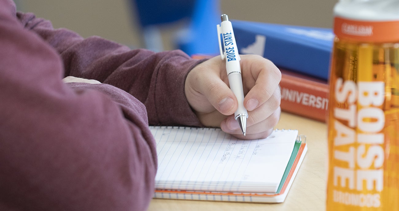 Boise State student writing to-do list