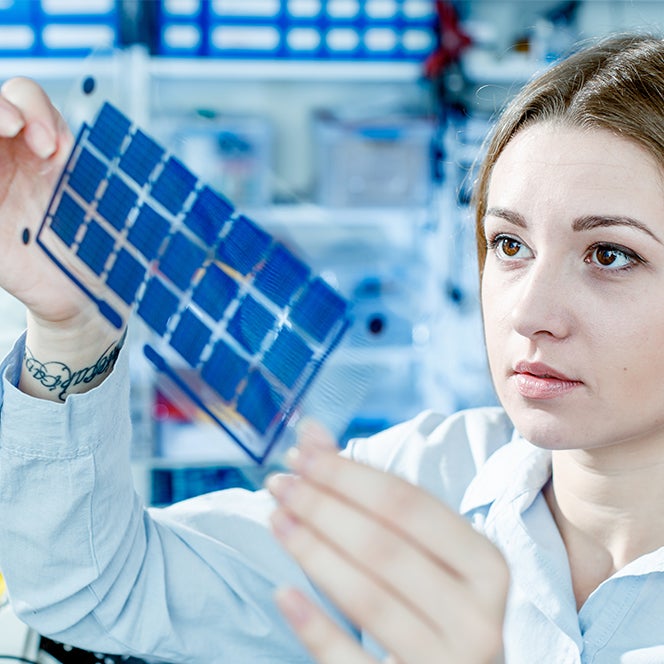 Girl looking at solar material