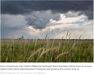 Photo of Storm clouds hover over a field in Oklahoma. Geologist there have been chasing down unusual signal in their seismic data that grew in frequency and spread as the summer wore on.