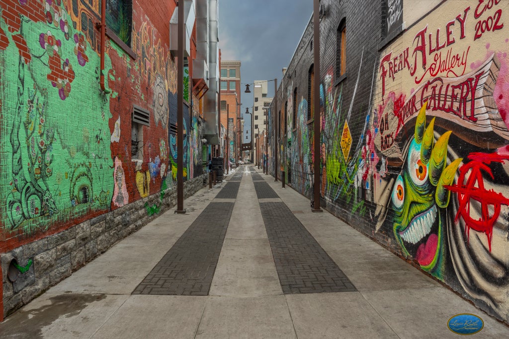 Graffiti art displayed all down the walls of Freak Alley