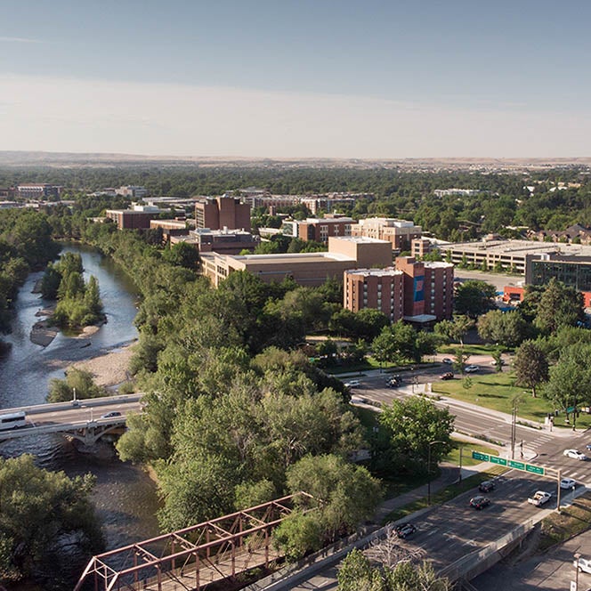 Aerial view of campus next to Boise River