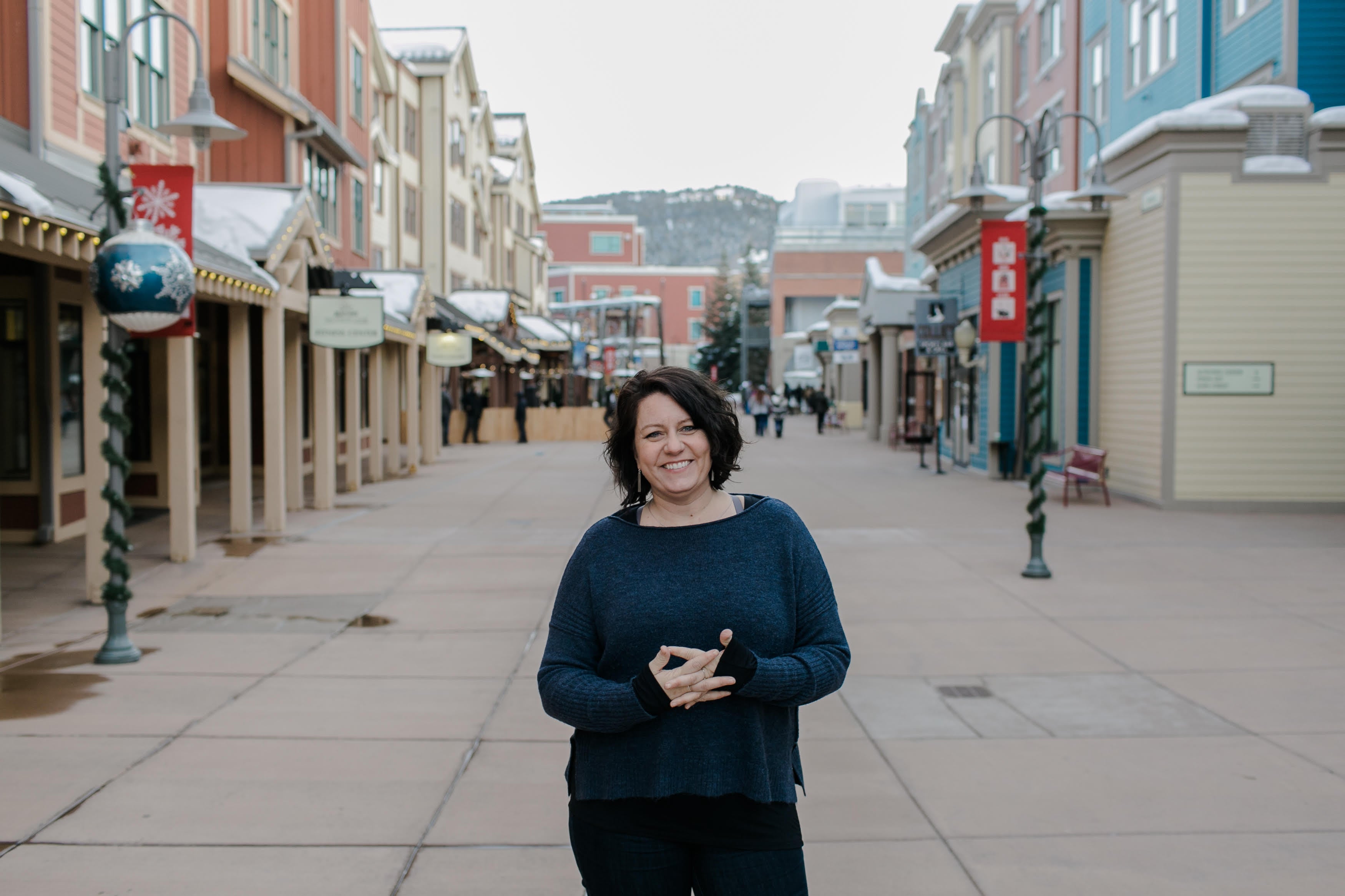 A photograph of director Amanda Stoddard