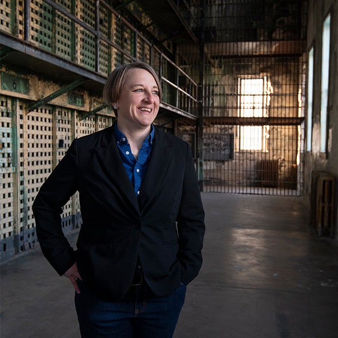 Historian Amber Beierle poses at the old penitentiary