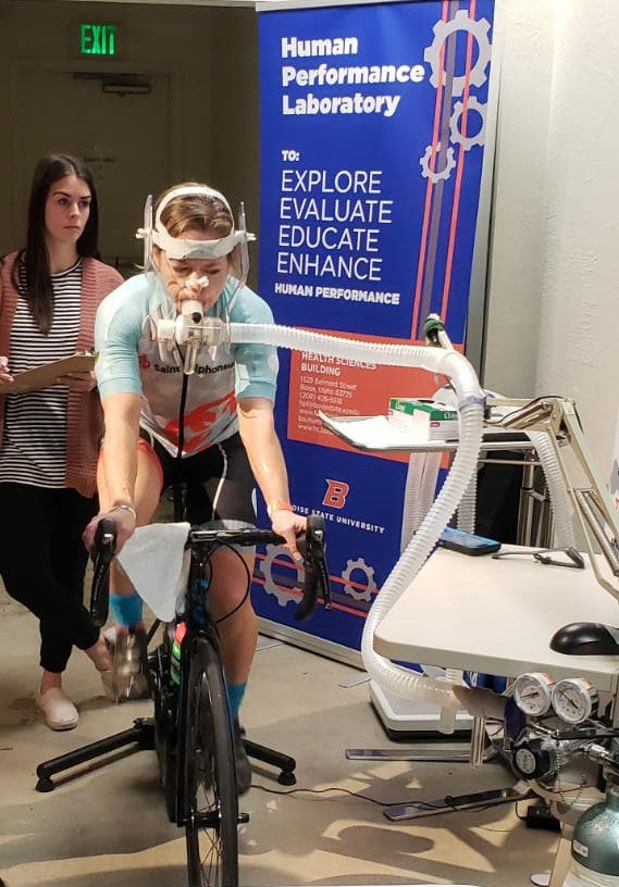 Athlete Erin on a stationary bike