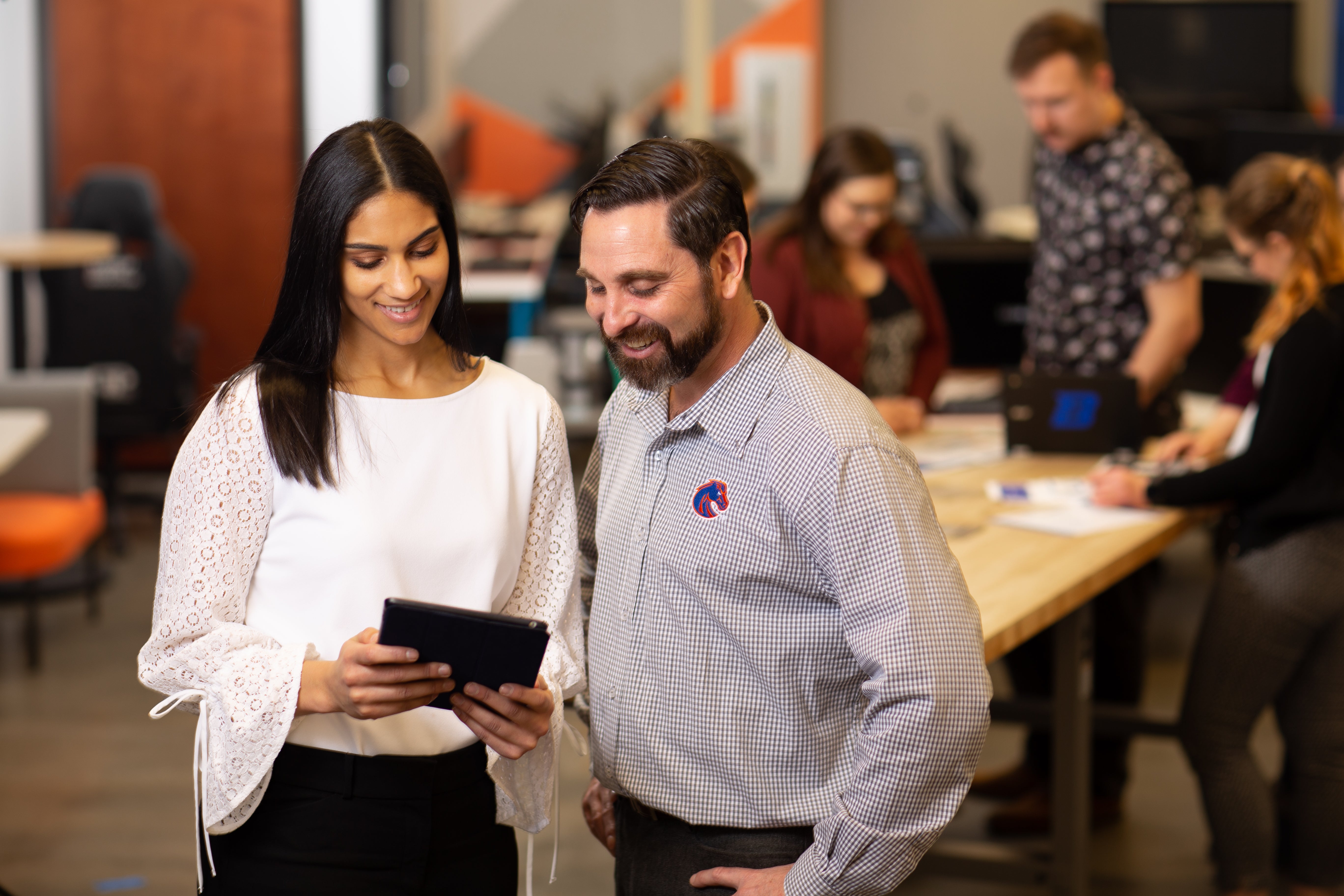 Public Relations group working around table