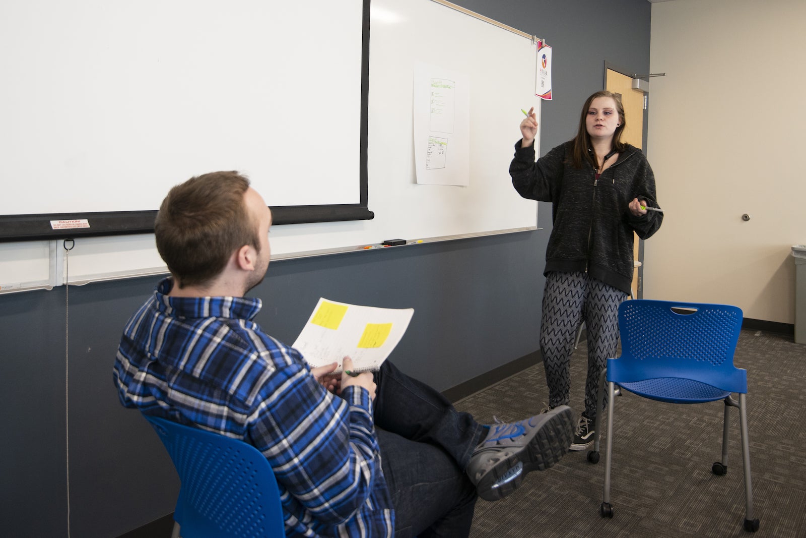 teen and instructor in classroom