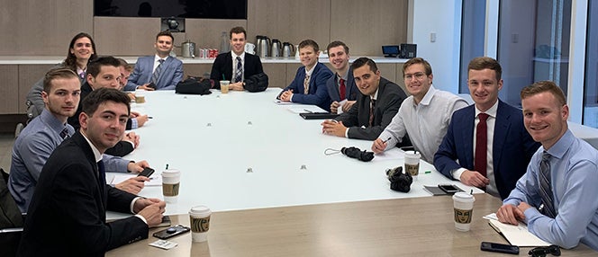 boise state students at a large conference table in new york city