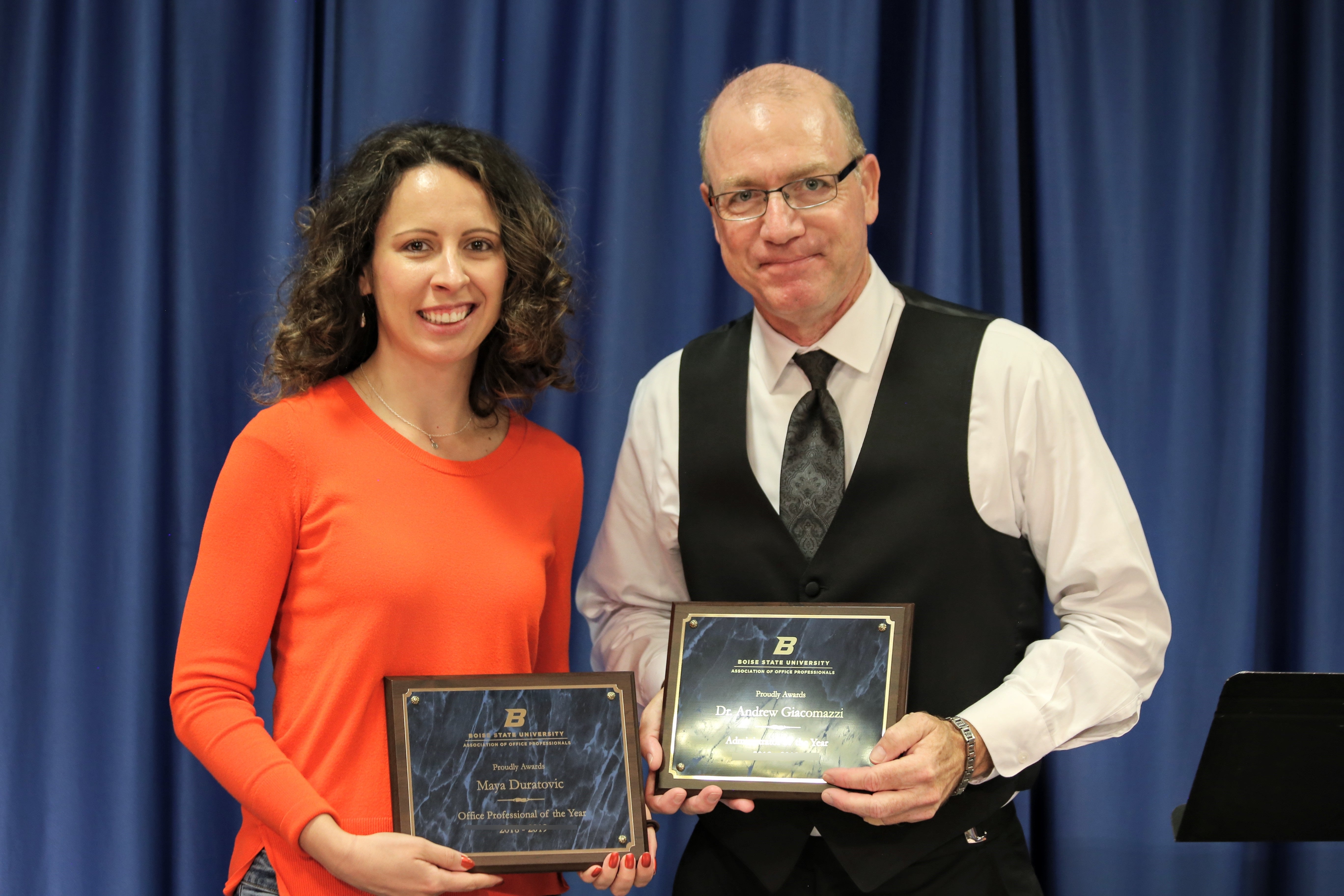 May Duratovic and Andrew Giacamazzi pose with their awards