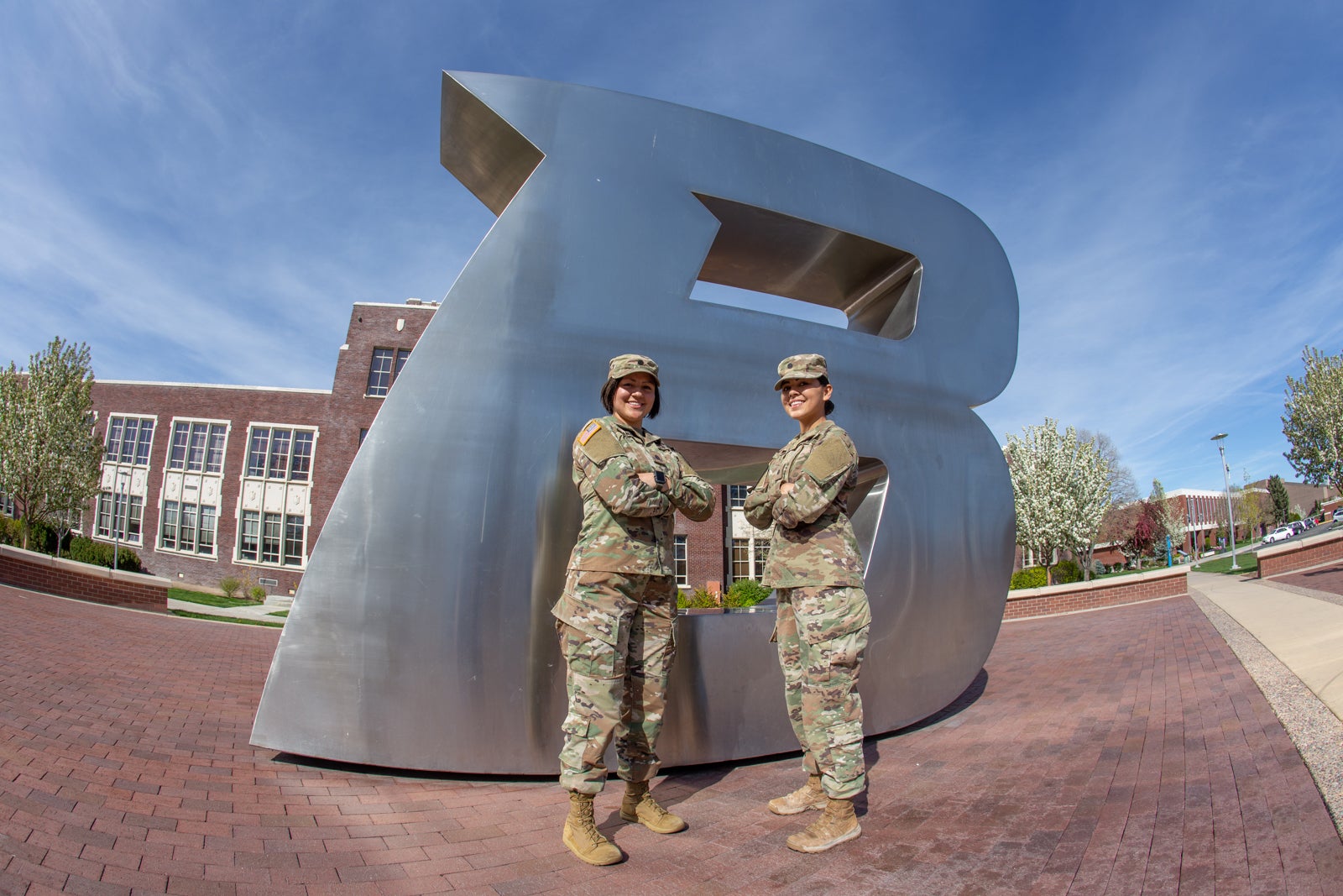 Service people in uniform in front of the B