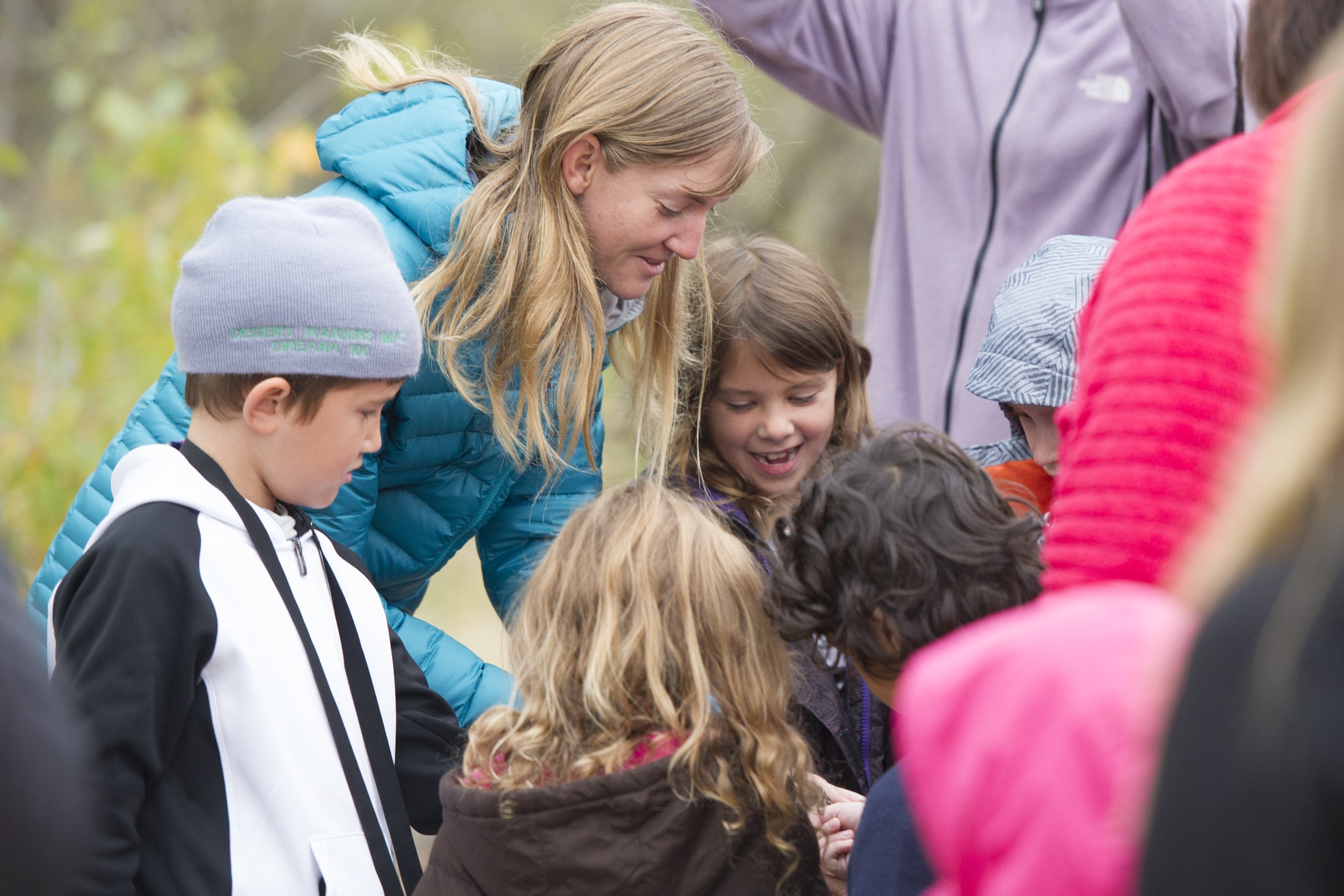 Heidi Ware showing birds to children