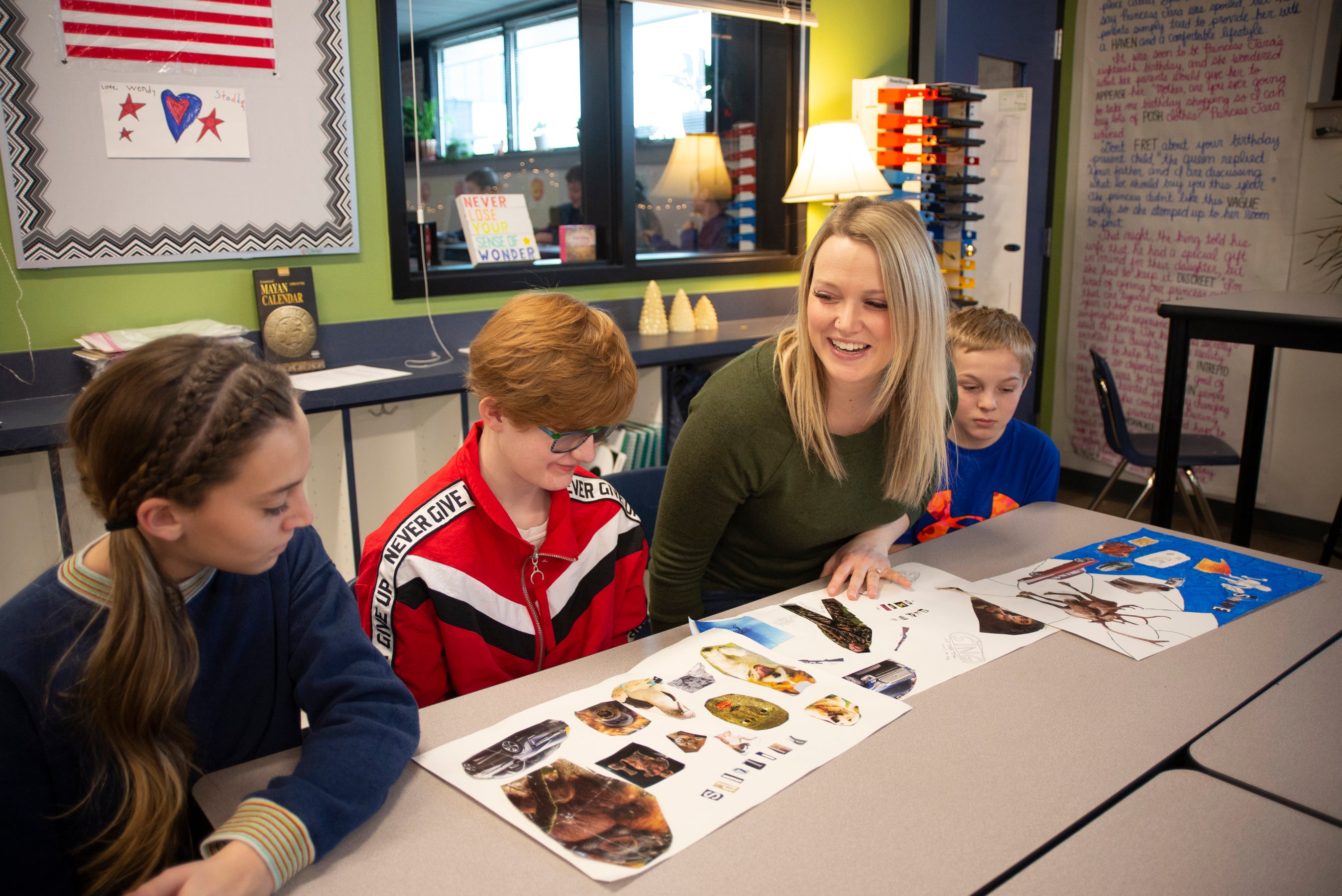 A teacher working with her students