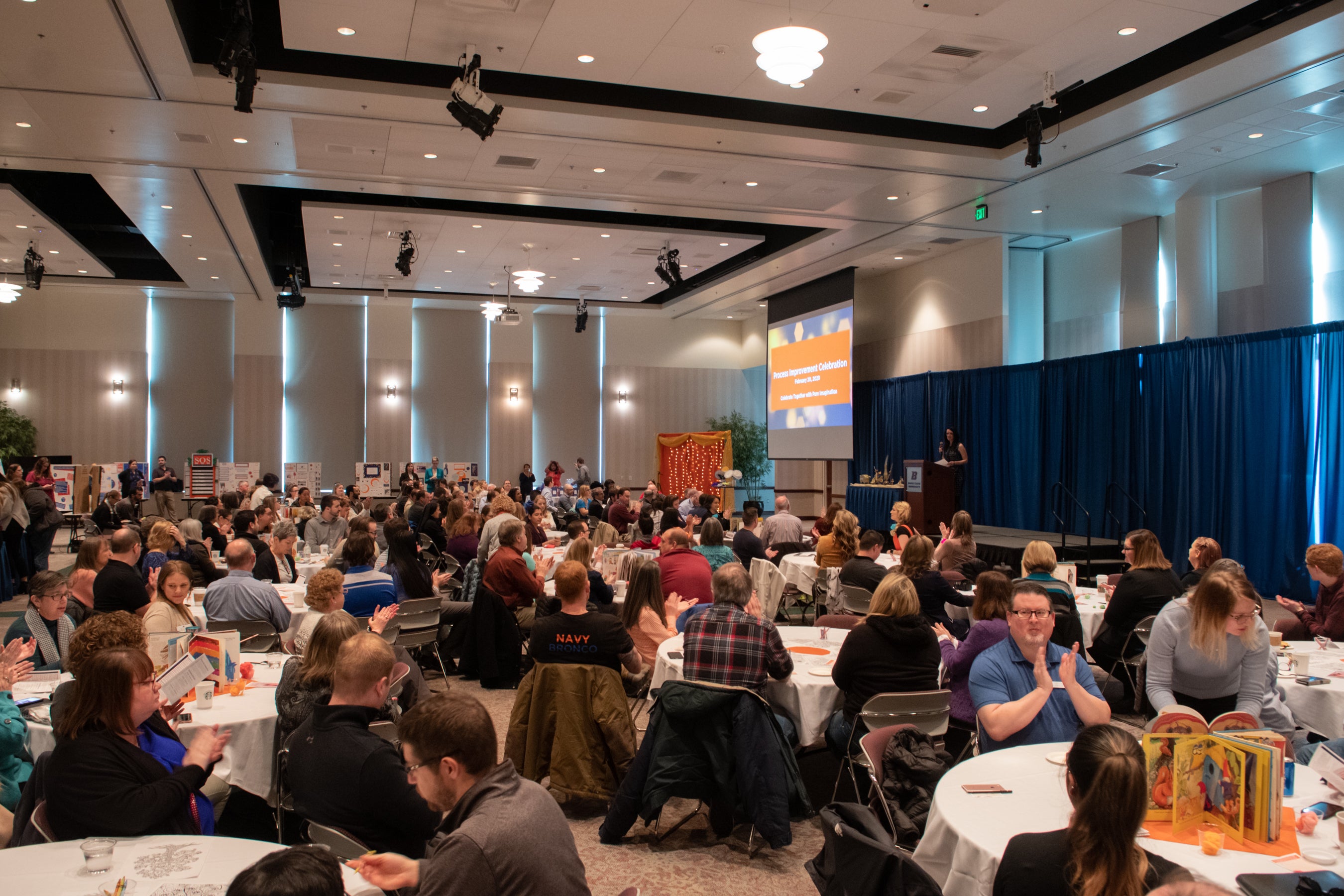 A ballroom full of seated people