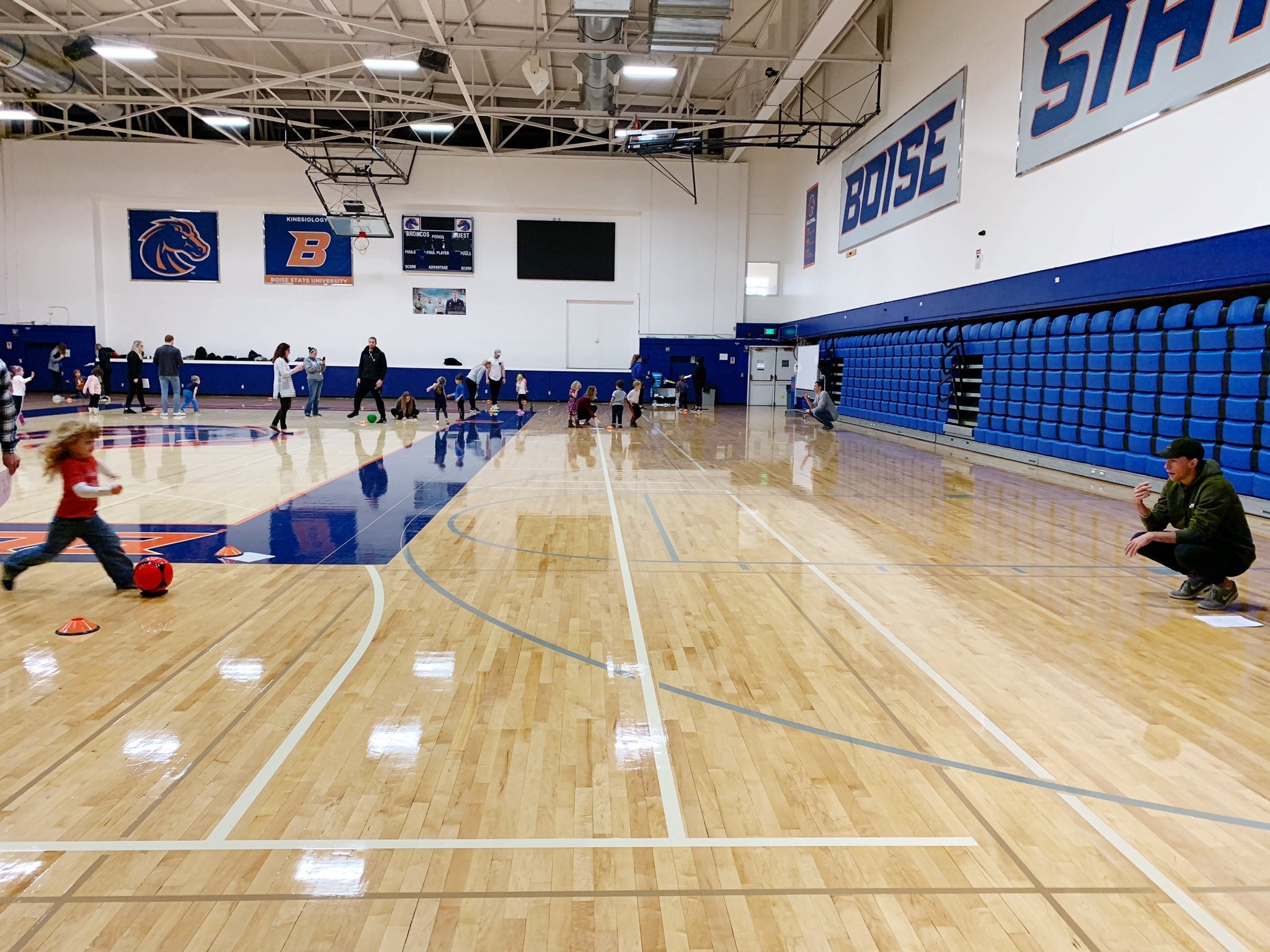 preschoolers from Children's Center run and play in BroncoGym