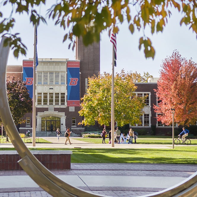 Administration building surrounded by colorful trees