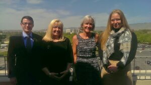 Christopher Daigle and Jennifer Moore with Tammy Ota and Sue Lovelace, Jordan family members.