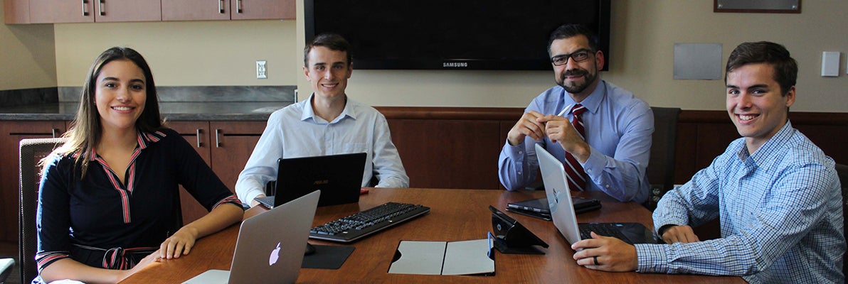 2019 beta gamma sigma officers in a meeting