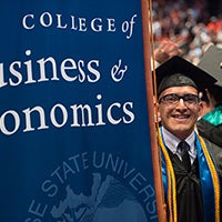 Ivan Sanchez, Boise State accountancy graduate banner marshal for COBE 2016 Spring Commencement