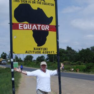 Krista Lyon at sign in Kenya on the equator