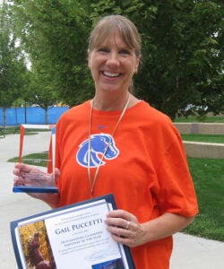 gail Pucchetti with classified staff of the year trophy