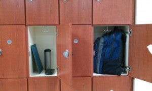 two opened lockers with books and back