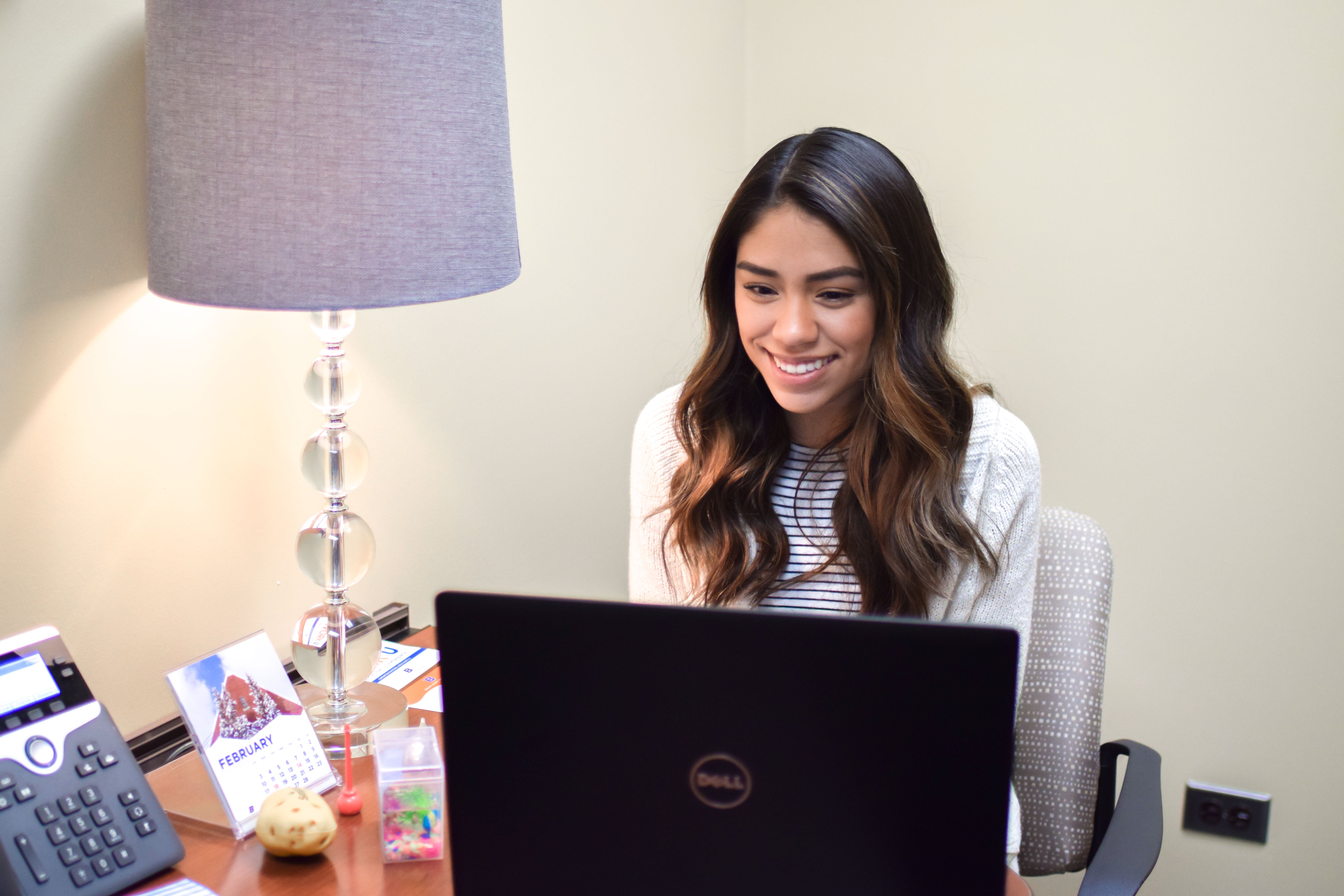 Student looking at a laptop screen