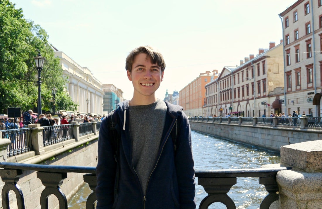 The author stands outside on a sunny day.