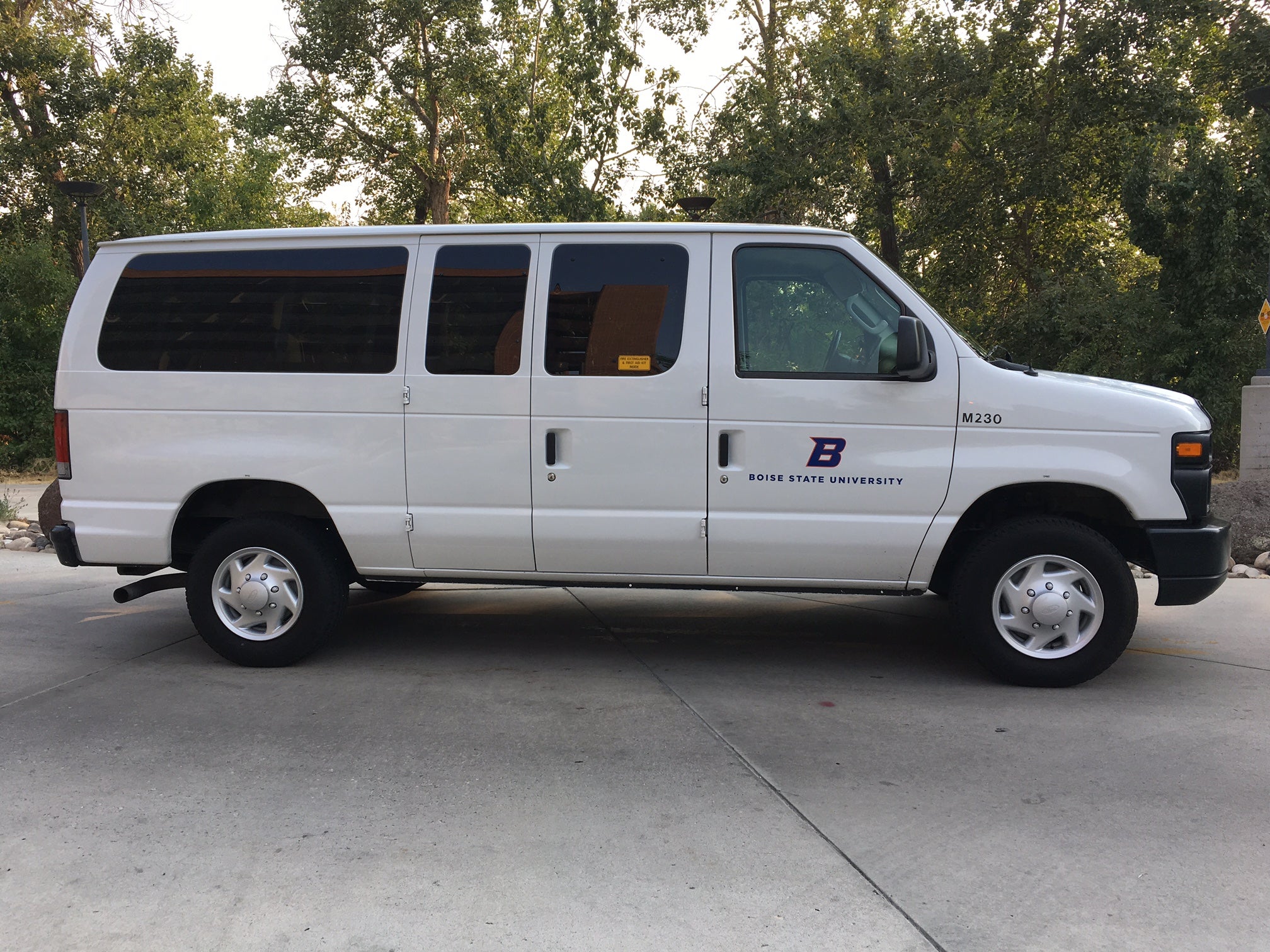 White 12 Person Passenger Van