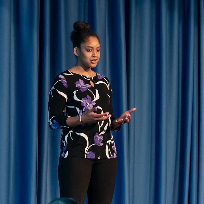 Sherise Porchia presenting at the 3MT competition