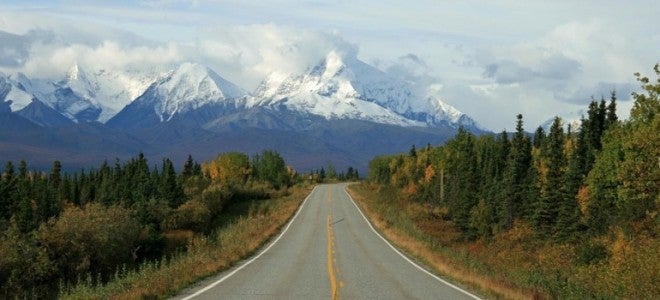 Alaskan road with mountains in back