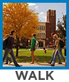 walk - people walking on sidewalk on college campus
