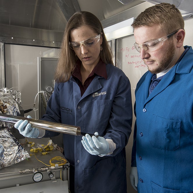 2 people in an electrical and computer engineering lab