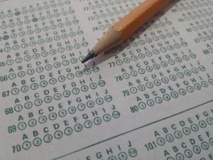 Image of scantron sheet with pencil on top
