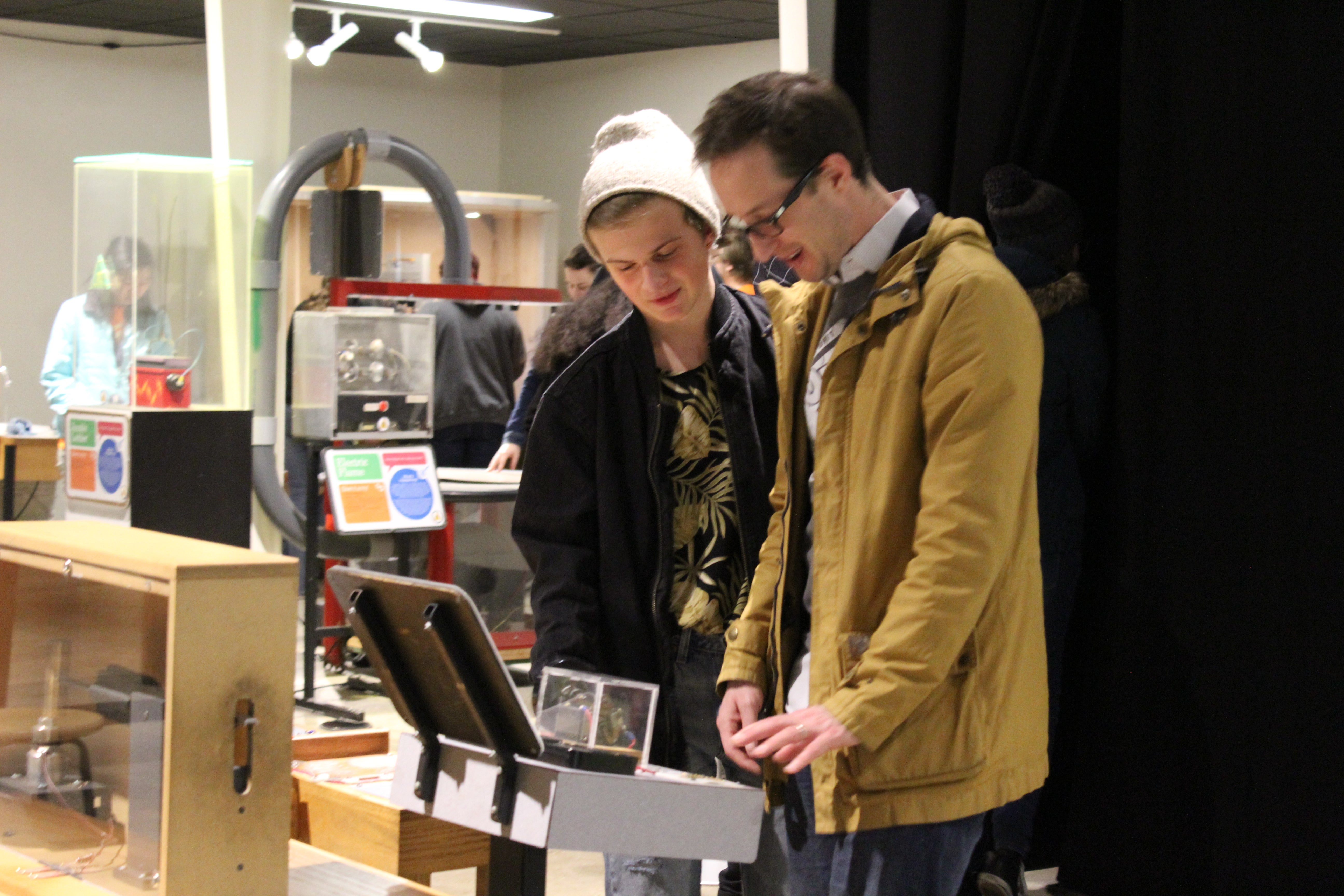 students explore exhibits at the Discovery center