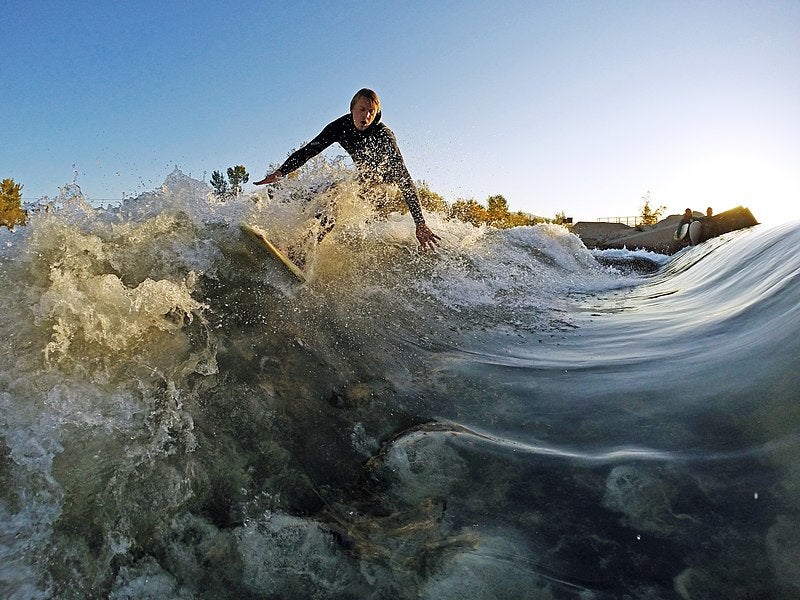 Man surfing in the Boise river