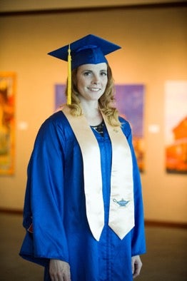 Valerie Morris in her cap and gown after graduating from the RNBS program